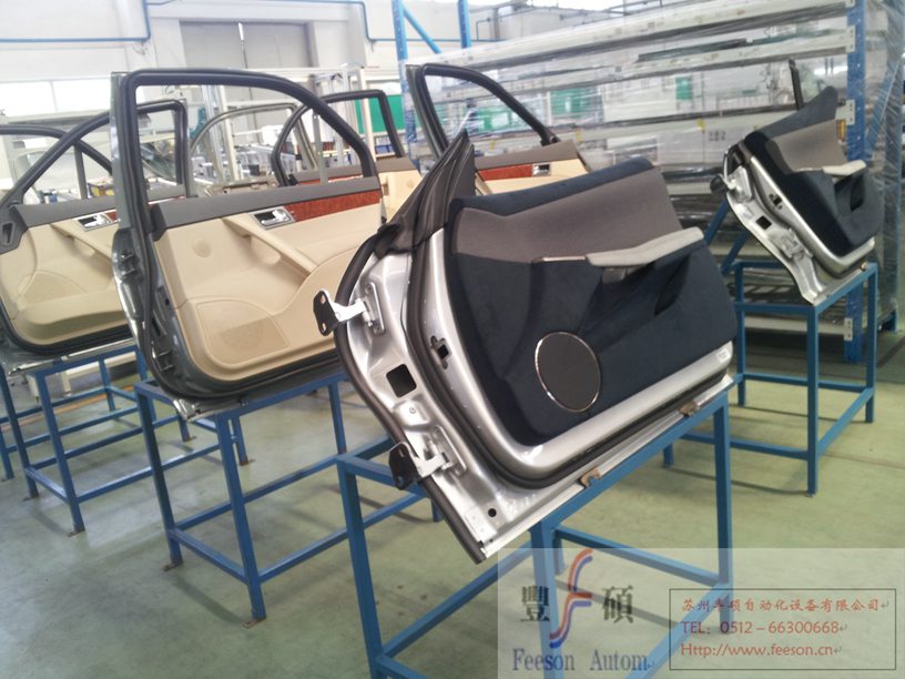 Automobile door panel assembly line